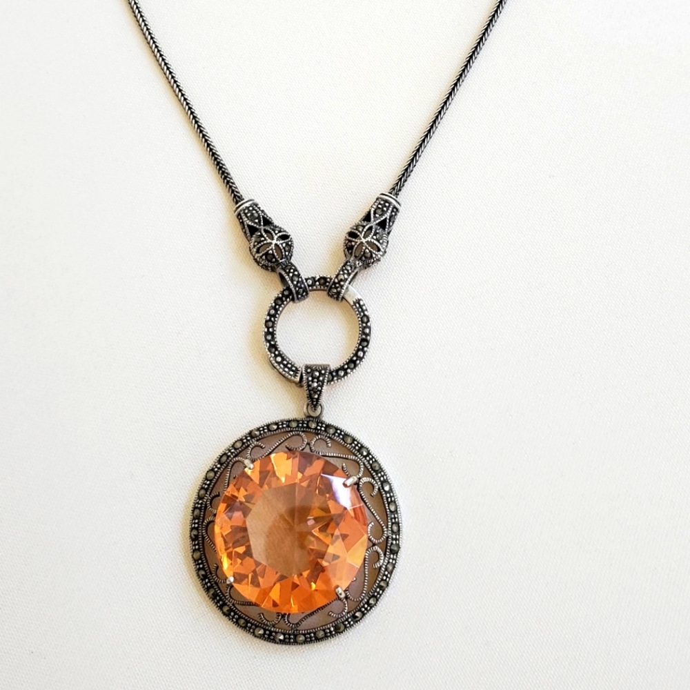 Necklace with yellow topaz stone. Costume jewelry.